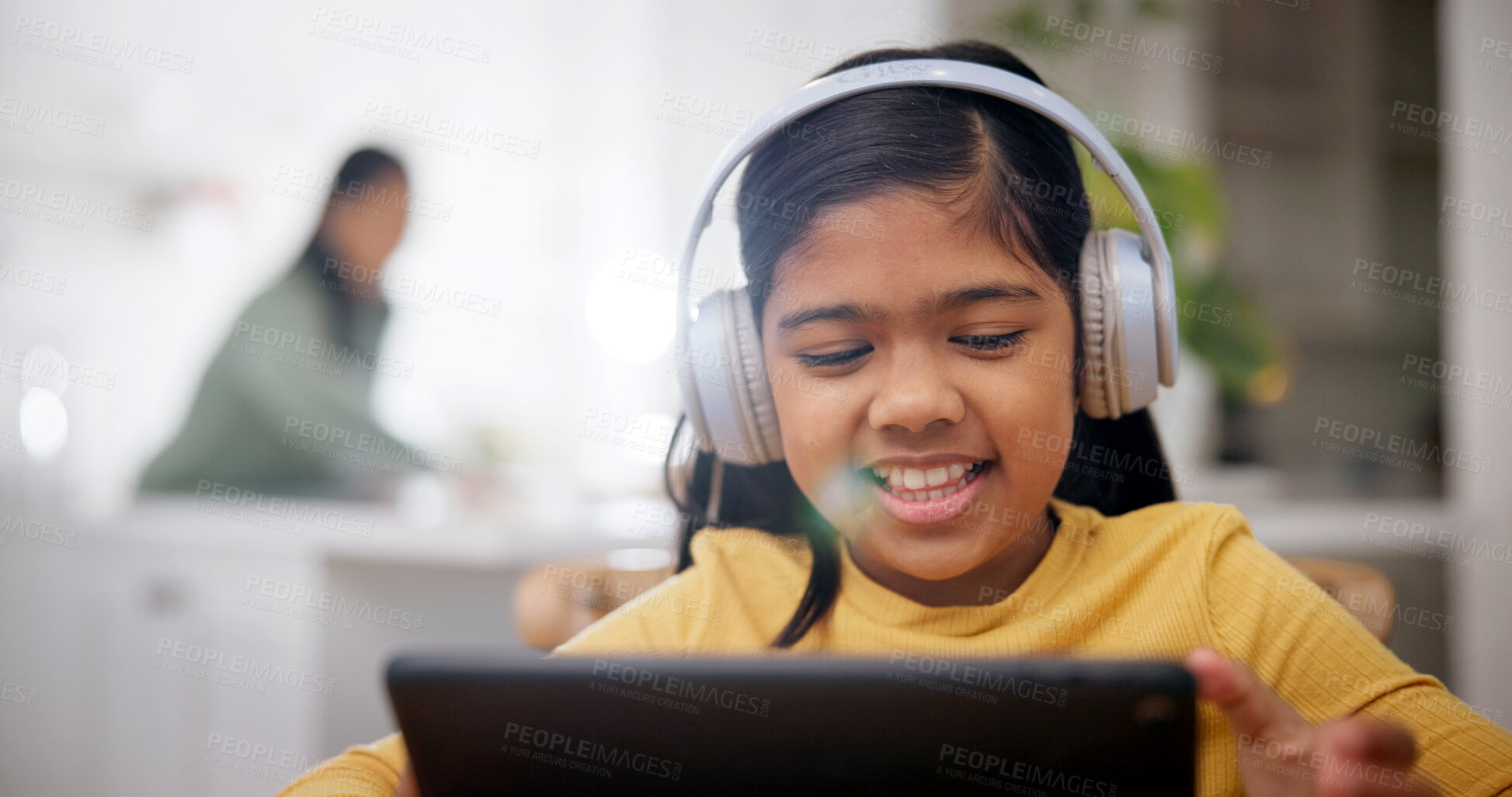 Buy stock photo Headphones, reading and child with tablet in house, online education and watch live stream of class. Smile, elearning app and girl with tech for academic development, research project or lesson video
