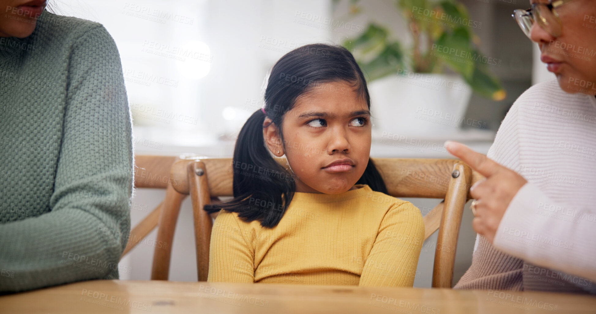 Buy stock photo Angry, child and family scolding in home for rules, discipline and explain disobedient behavior. Strict, parents and lecture girl with bad attitude, teaching consequences and warning for boundaries