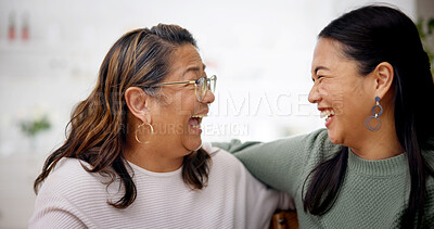 Buy stock photo Happy, hug and woman with senior mother on sofa in home for bonding, connection or family. Laugh, retirement and Asian person embracing elderly mom for joke, safety and love in living room at house.