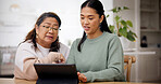 Reading, woman and senior mother with tablet in home, homepage setup or system teaching for bonding. Tech education, learn or Asian people with advice for digital literacy, app navigation or guidance