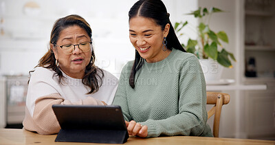 Buy stock photo Teaching, woman and senior mother with tablet in home, homepage setup or system review for bonding. Tech education, learning or Asian people with advice for digital literacy, app navigation or smile