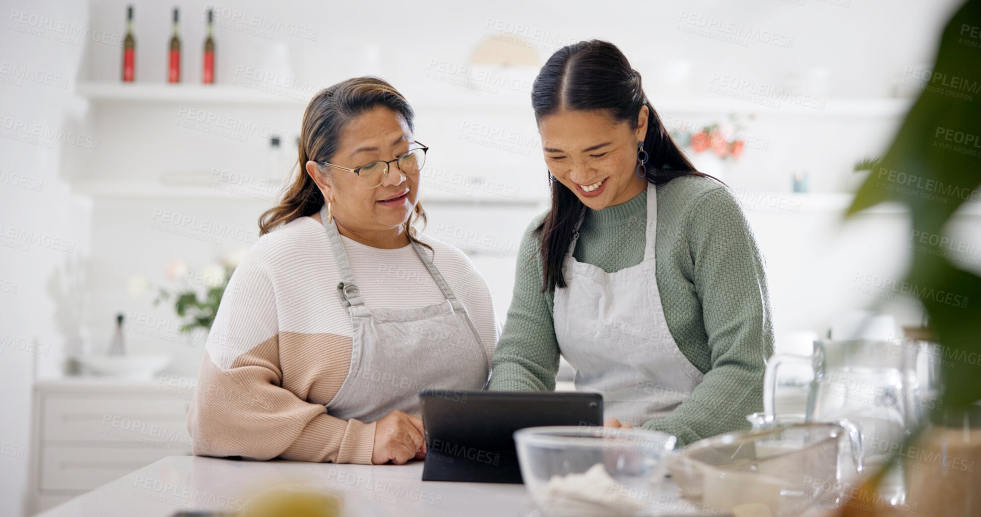 Buy stock photo Tablet, cooking and smile with senior mother and daughter in kitchen for learning, recipe and blog. Family, women and culinary skill with digital tech in home for meal prep, help and online tutorial