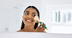 Woman, smile and makeup brush in bathroom with mirror, morning routine or powder application for beauty. Space, female person and cosmetic tools in home with reflection, grooming and getting ready.