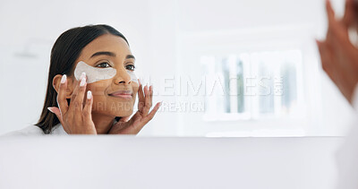Buy stock photo Woman, skincare and eye mask in bathroom with mirror, reduce dark circles or self care in morning. Space, happy person and apply collagen patch in home with reflection, beauty cosmetics and wellness.