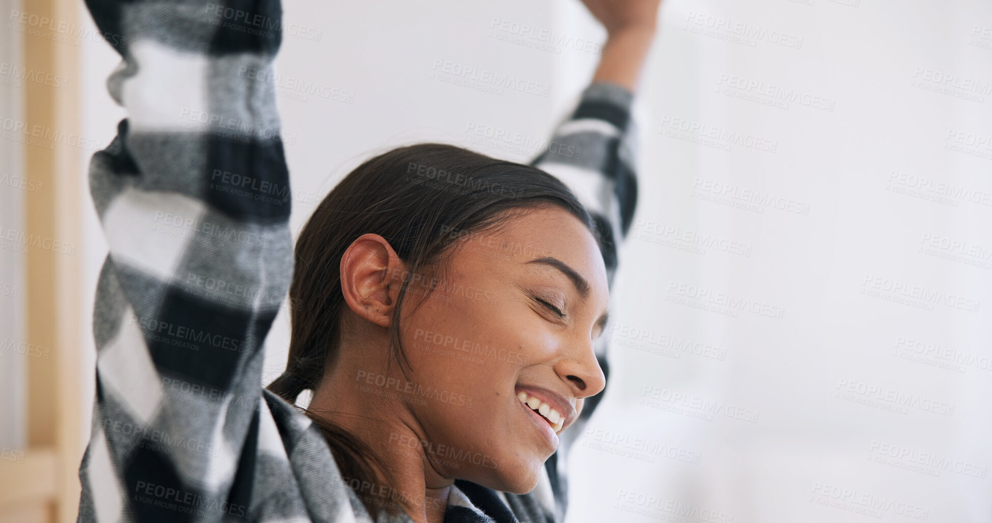 Buy stock photo Morning, wake up and woman stretching in home for wellness, circulation and ready to start day. Smile, person and refreshed in bedroom, muscle relief and peace with calm in apartment with space