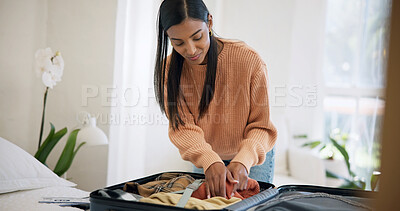 Buy stock photo Pack, suitcase and woman with clothes in bedroom, travel preparation and holiday trip for smile. Home, getting ready and happy person with organization of vacation apparel, weekend getaway or luggage