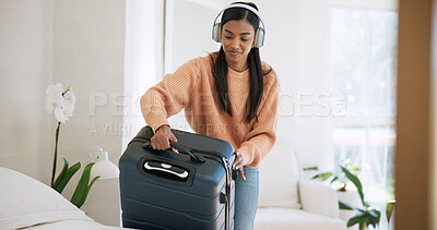Buy stock photo Smile, suitcase or woman with headphones in hotel room, holiday trip or music for travel preparation. Vacation luggage, streaming playlist and person with completed packing, leaving and audio tech