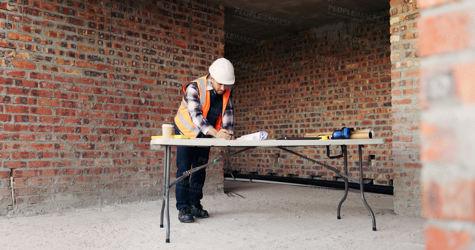 Buy stock photo Blueprint, man and construction worker on site with planning for home renovation, repairs or development. Infrastructure, floor plan and civil engineer by brick wall for house maintenance or building