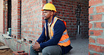 Construction site, thinking and black man with break, engineering and reflection for quality control. Safety, risk assessment and person with maintenance, compliance and property for development