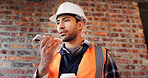 Construction site, man and voice note with phone, engineering and update for quality control. Tech, risk assessment and person with communication, compliance and property renovation with development