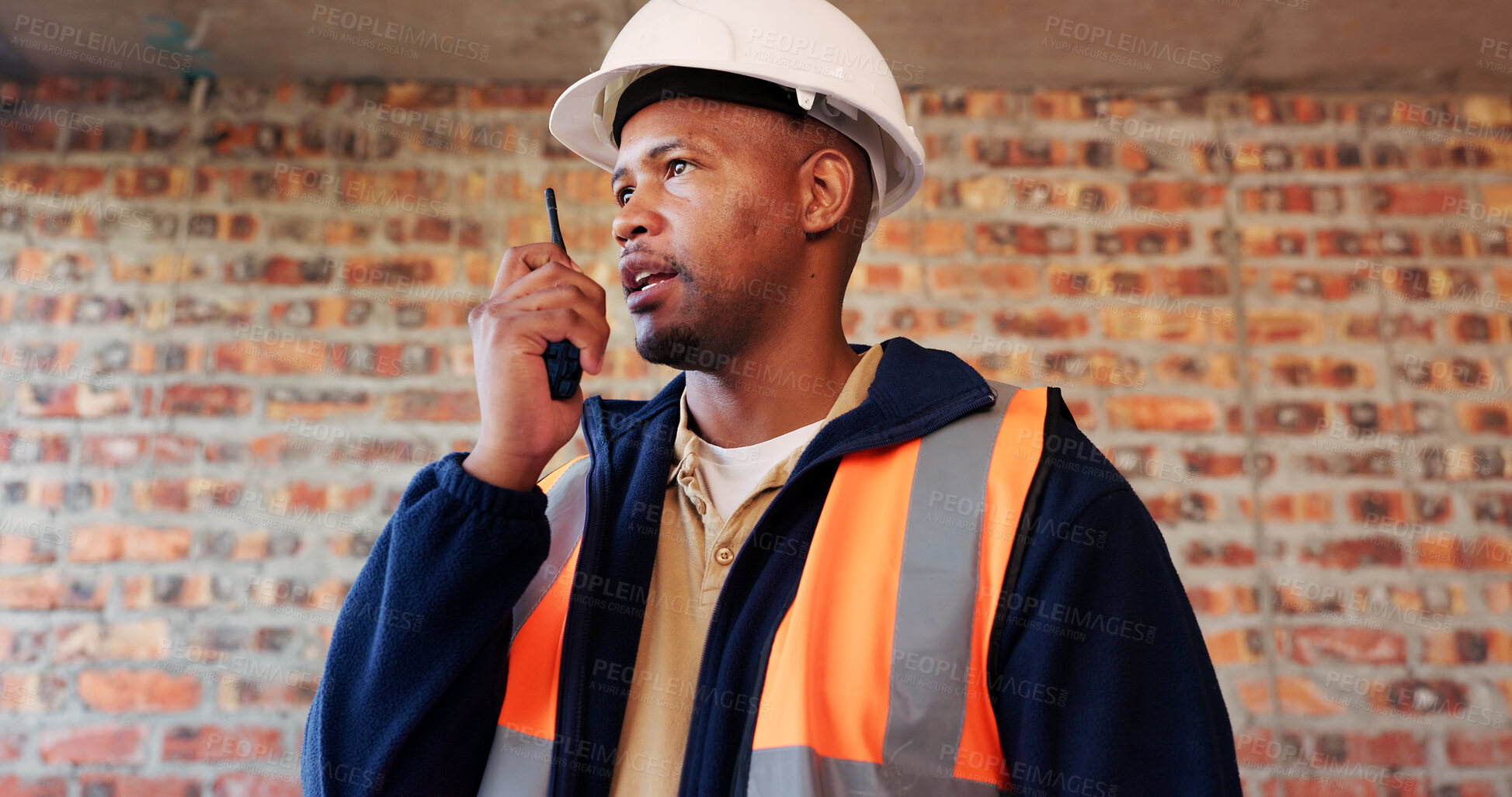 Buy stock photo Construction site, radio and black man with update, engineering and chat for quality control. Tech, risk assessment and person with communication, compliance and property renovation with development