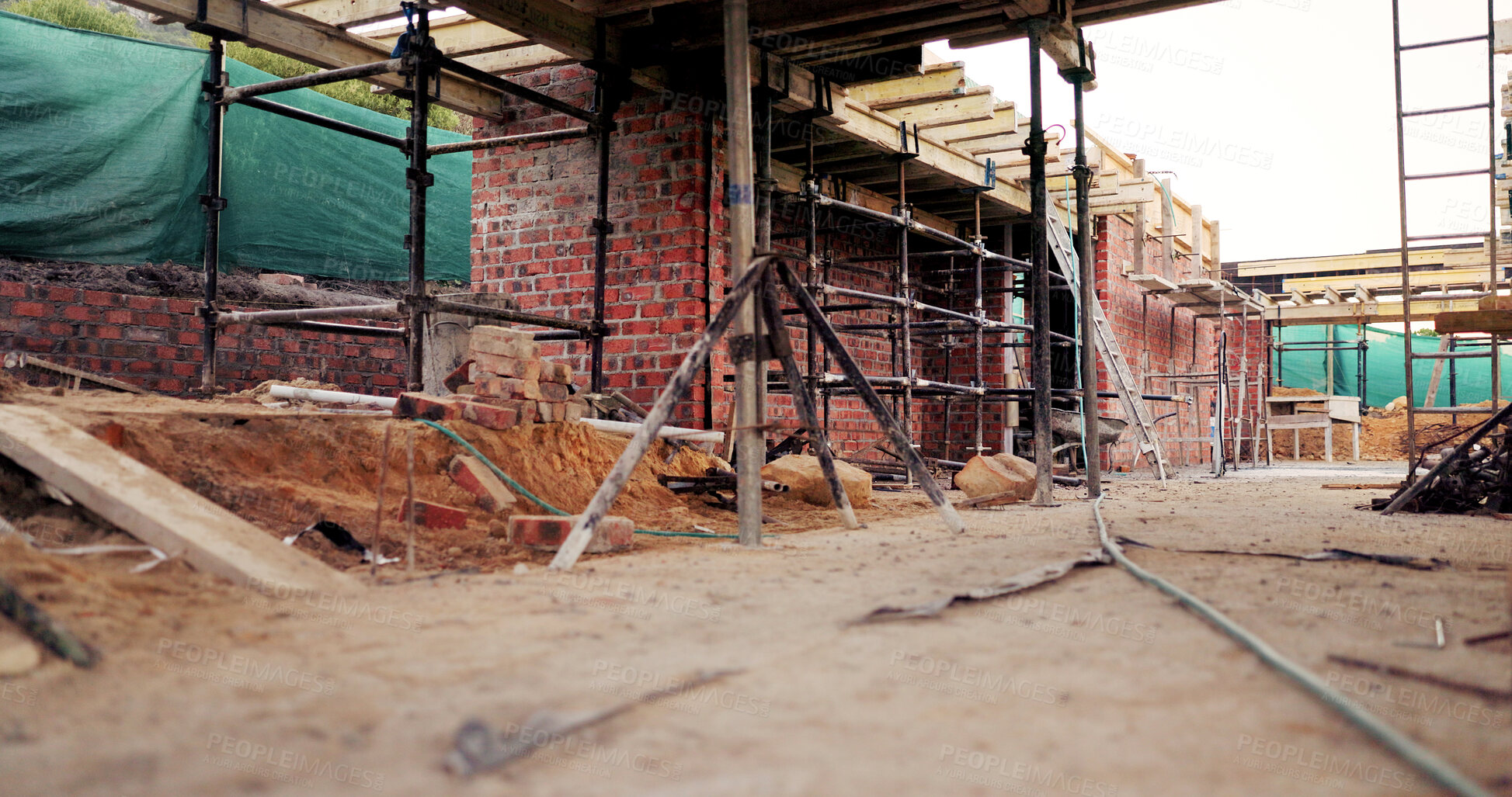 Buy stock photo Scaffolding, property and real estate project for construction, development and home renovation. House, brick wall and architecture with structure, building and suburban improvement or engineering