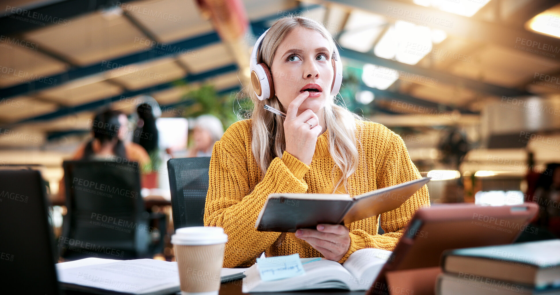Buy stock photo Student, woman and thinking with book in library for higher education, learning or assignment. Thoughtful, female person or academic learner with notebook or headphones for project research in study