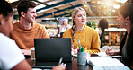 Education, laptop and talking with study group in library for development, research or scholarship. College, computer and learning with student friends on university campus for feedback or report