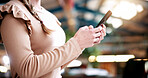 Hands, student and woman at campus with phone, research and exam results for education. Typing, learning or female person at college with mobile, application and enrollment information for university