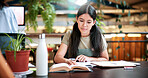 Reading, study and books with woman in college for education, thesis project and exam prep. Learning, university assignment and knowledge with student on campus library for research and school course