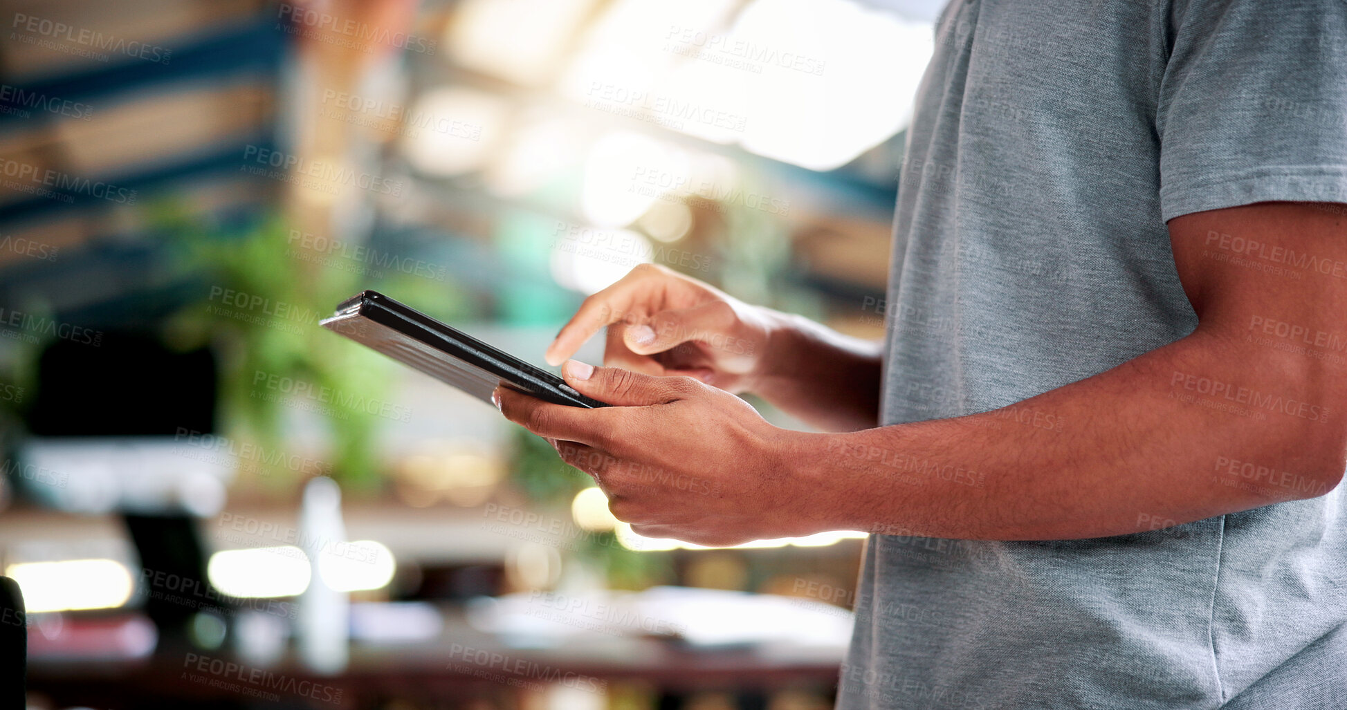 Buy stock photo Hands, man and student with tablet in library at university with email for exam or test results. Research, digital technology and person with online communication for college scholarship on campus.