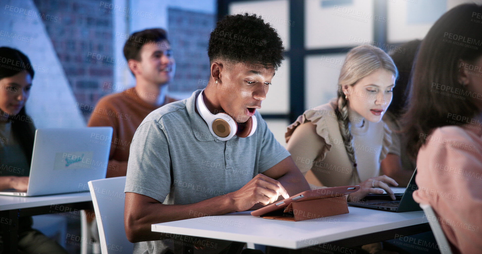 Buy stock photo Student, man and surprise in college with tablet, education and test results notification for course. Person, shock and scroll in classroom with tech, email or announcement for university exam grade.
