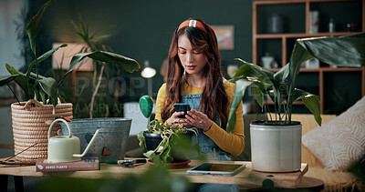 Buy stock photo Plants, reading or woman with mobile in home, gardening forum or internet search for conservation tips. Review, smile or florist with phone for horticulture blog, care instructions or revival advice