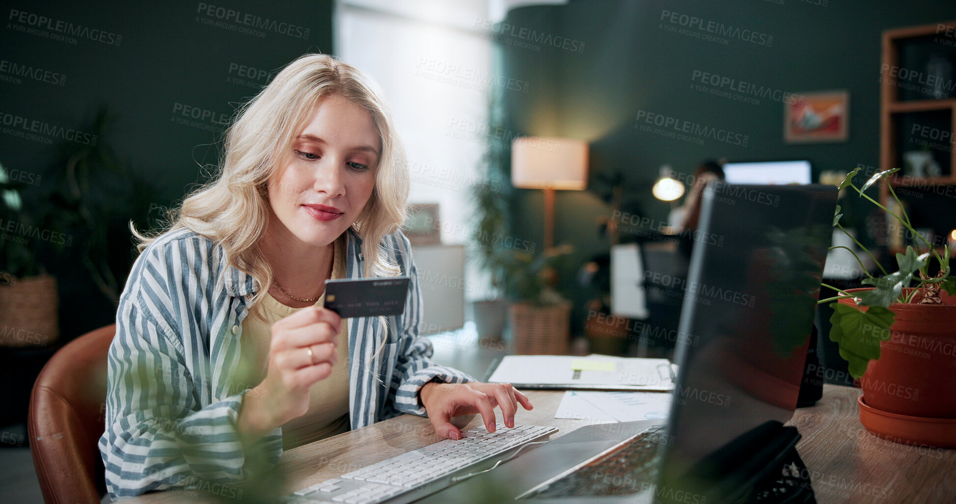 Buy stock photo Credit card, laptop and typing with woman in agency for online shopping, ecommerce and sale. Digital payment, banking website and person in office for coworking, transaction or debit subscription