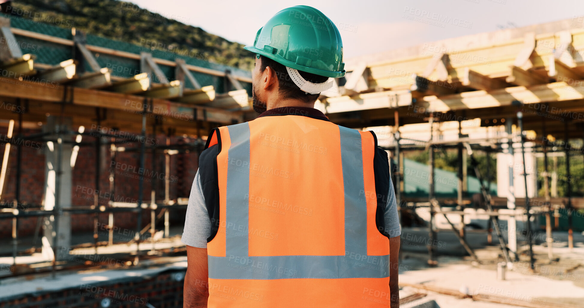 Buy stock photo Construction site, thinking and back of man for inspection, planning and building project. Architecture, civil engineer and person with idea for property development, renovation and infrastructure