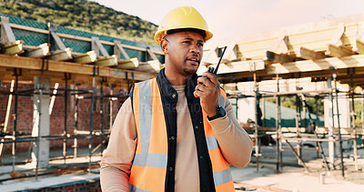 Buy stock photo Talking, outdoor and black man with radio on construction site for contact, update and planning. Architecture, engineering and person with communication for building plan, feedback and infrastructure