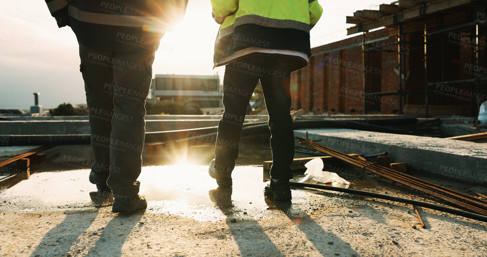 Buy stock photo Legs, walk and people in construction for site inspection, building progress or project management. Flare, feet and supervisor team outdoor for renovation compliance, urban development or maintenance