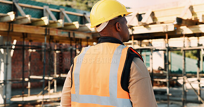 Buy stock photo Construction, thinking and back of black man for inspection, planning and building project. Architecture, engineer and person with reflection for property development, renovation or infrastructure