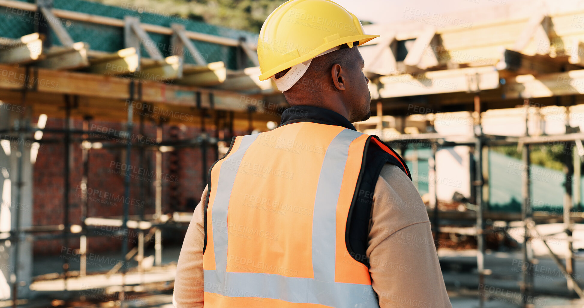 Buy stock photo Construction, thinking and back of black man for inspection, planning and building project. Architecture, engineer and person with reflection for property development, renovation or infrastructure