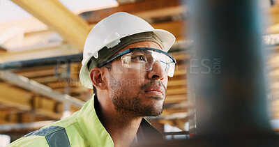Buy stock photo Construction, man and thinking with goggles on site for building progress, property vision or safety. PPE, foreman and reflection outdoor for renovation inspection, risk assessment or quality control