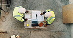 People, architect or team with blueprint on construction site above for building design or planning. Top view, contractor or civil engineer with documents or floor layout for architecture development