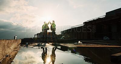 Buy stock photo Rooftop, team or people with high five for construction, celebration or property renovation complete. Outdoor, flare or architect with support for building maintenance, project success or achievement