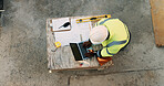 Documents, laptop and above of man on construction site for planning, building permit and compliance. Architecture, engineer and person on computer for renovation, online blueprint and infrastructure
