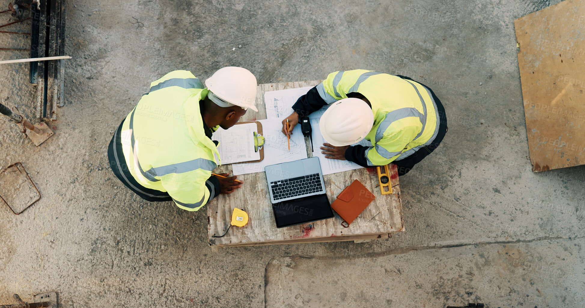 Buy stock photo Meeting, laptop and men with blueprint on construction site for planning, building project and teamwork. Architecture, discussion and above of people for renovation, layout or infrastructure design