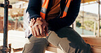 Construction, hands and man with wrist pain on site for physical strain, arthritis or work accident. Worker cramp, person and muscle fatigue outdoor from manual labor, tender joint or injury on duty