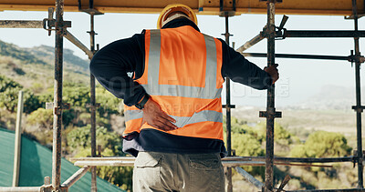 Buy stock photo Construction, injury and man with back pain for accident, stress and overworked at building site. Architecture, engineering and person with pressure for fibromyalgia, muscle sprain and hurt outdoor