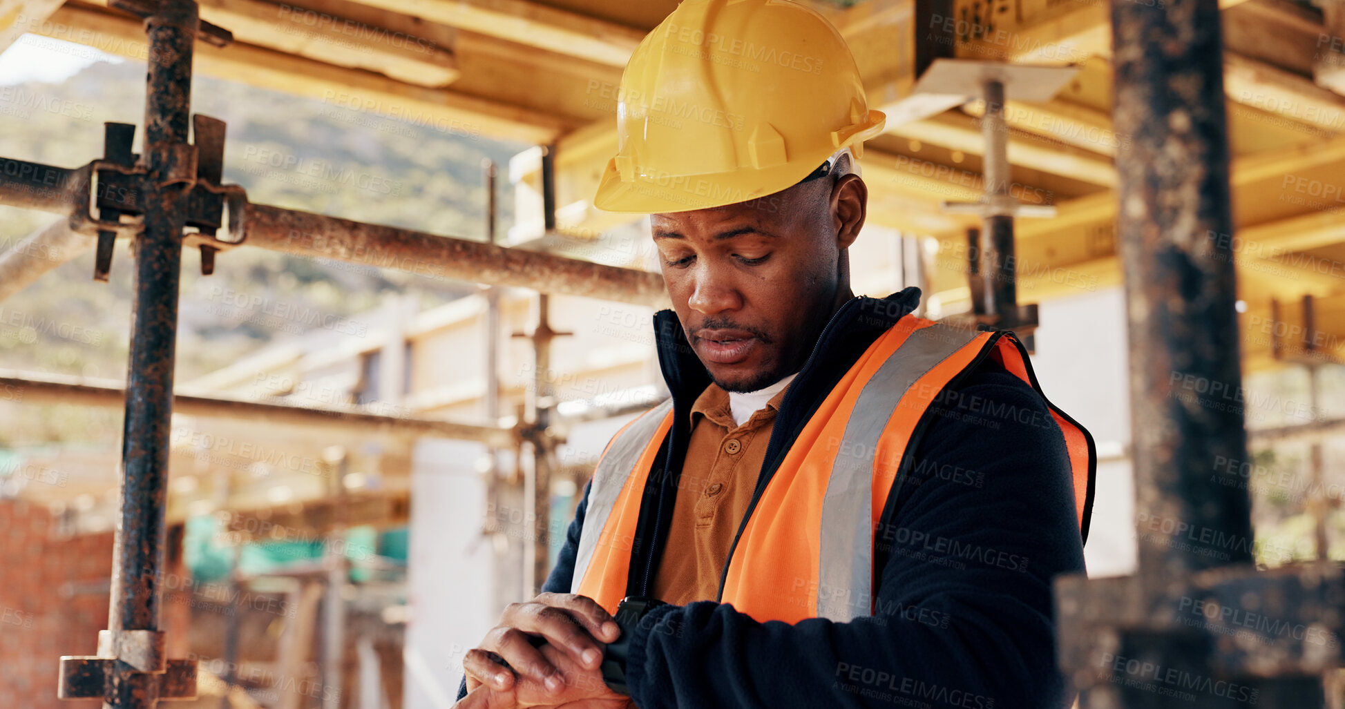 Buy stock photo Watch, black man and construction worker on site with time management for renovation deadline. Professional, building schedule and African male civil engineer with late for property maintenance.