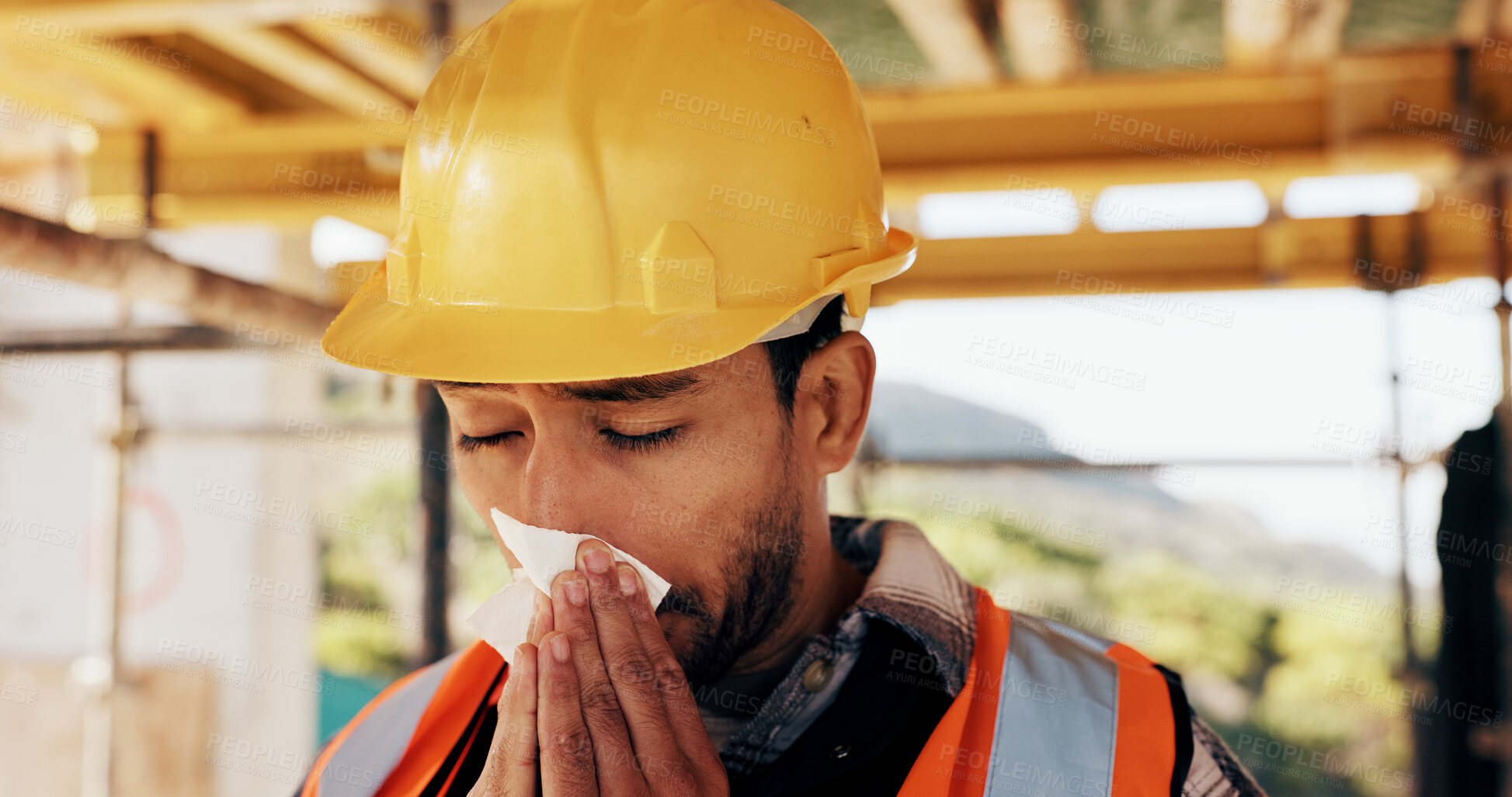 Buy stock photo Architect, sick or man blowing nose with tissue for influenza, disease or virus on construction site. Male person, contractor or civil engineer with cold or flu symptom for hayfever, sinus or allergy