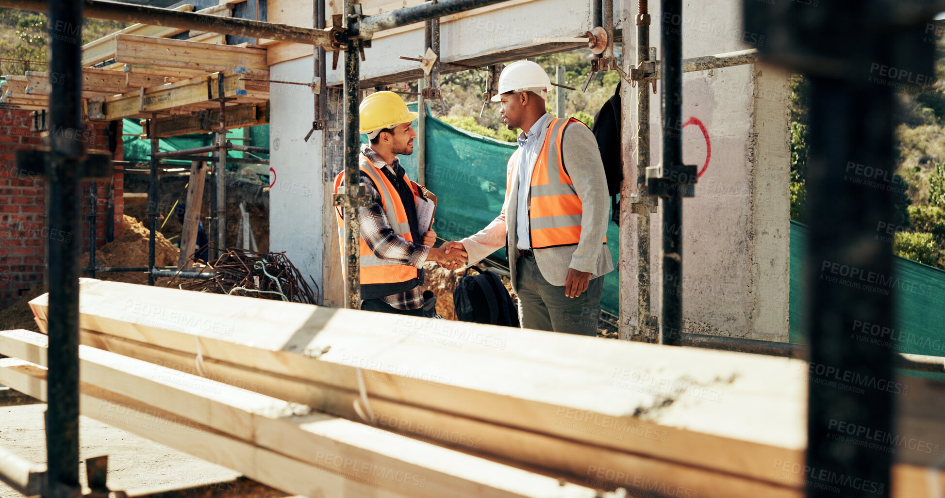 Buy stock photo Civil engineering, handshake and men with clipboard, construction and safety inspection for project. Architect, shaking hands and happy people with checklist for architecture, agreement and teamwork