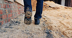 Walking, feet and person on construction site for planning, infrastructure and property inspection. Architecture, civil engineering and legs of worker for building, renovation and remodeling project