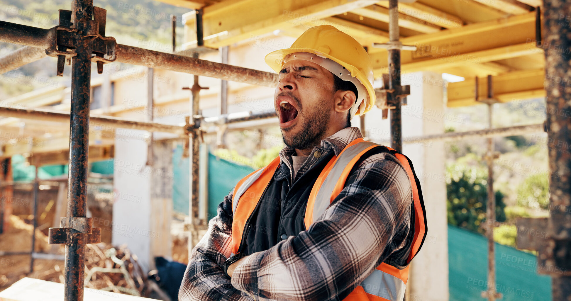 Buy stock photo Tired, man and construction worker with yawn on site for burnout, overtime or fatigue with building. Exhaustion, renovation deadline and male civil engineer by infrastructure with stress for repairs.