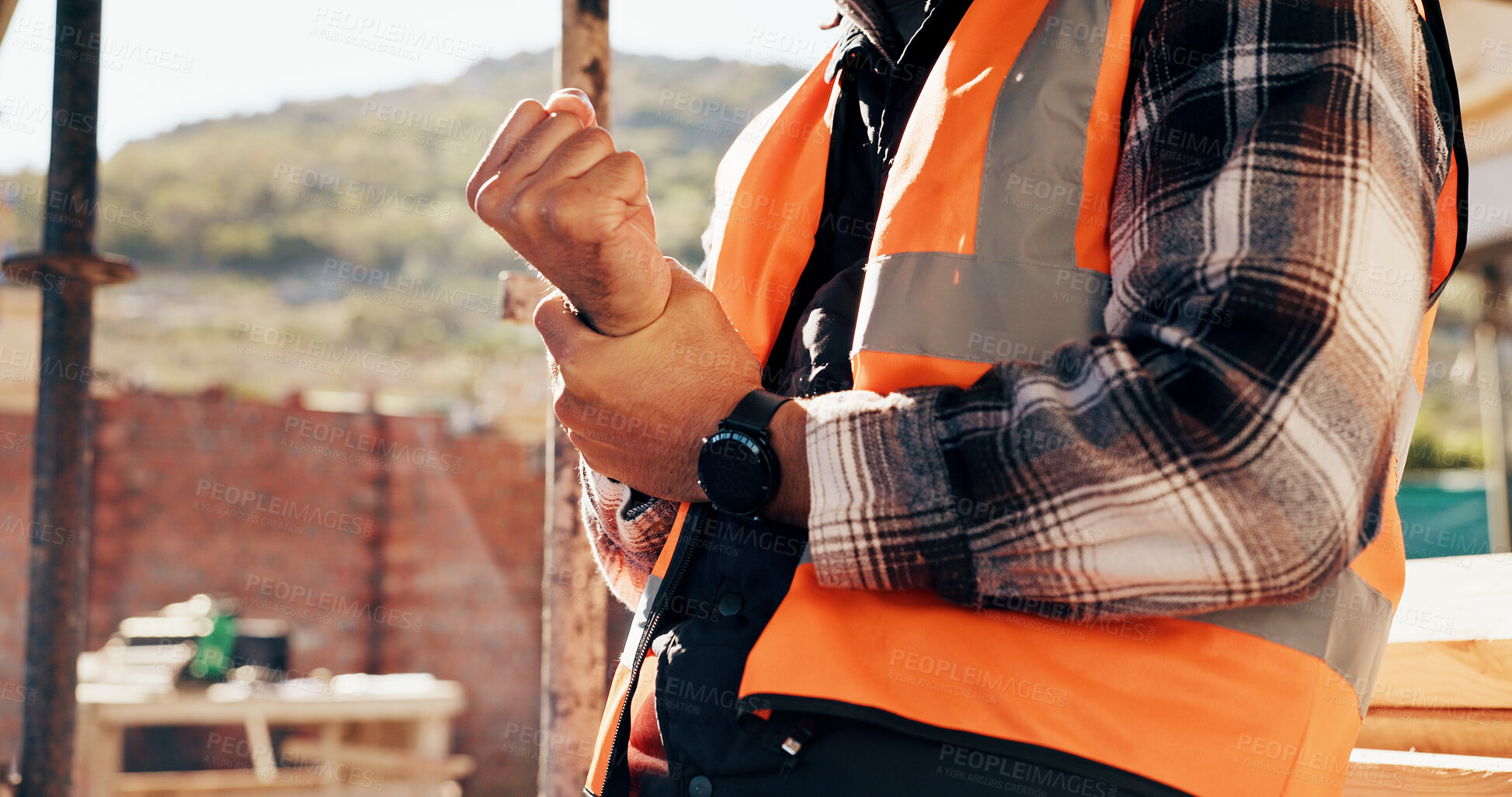 Buy stock photo Person, architect or wrist pain with injury on construction site for overworked strain or accident. Contractor, civil engineer or sore hands with arthritis, sprain or discomfort for building incident