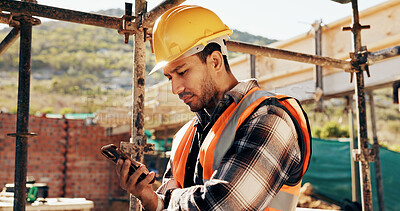 Buy stock photo Phone, man and construction worker on site with texting for feedback on building infrastructure. Cellphone, communication and civil engineer with email for review on home renovation or development.