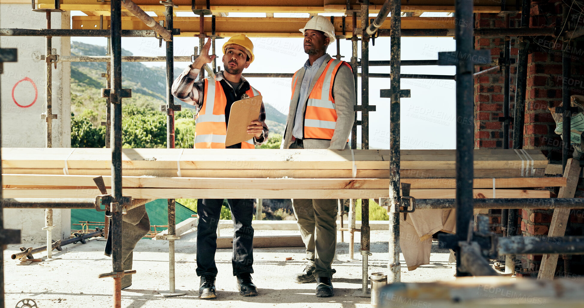 Buy stock photo Civil engineering, team and men with clipboard, construction site and safety inspection for project. Architect, pointing and people with ideas for architecture, talking and scaffolding at building