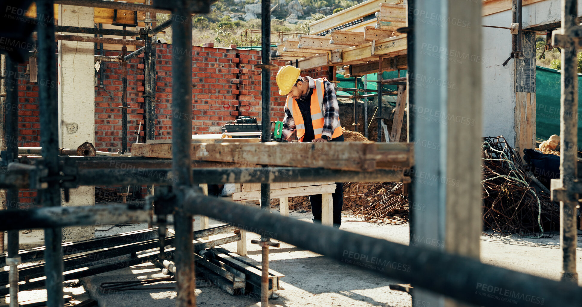 Buy stock photo Construction, scaffolding and man with planning on site for renovation, code compliance or safety. Civil engineering, foreman and project management outdoor for building upgrade, inspection or review