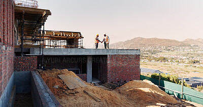 Buy stock photo Architect, handshake and men on rooftop, construction site or collaboration for architecture project. Civil engineering, shaking hands and people with gesture on building space, agreement or teamwork