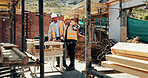 Discussion, men and construction workers on site with planning for property renovation or repairs. Conversation, professional and civil engineers in collaboration for home building or maintenance.