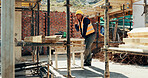 Construction, man and talk with radio on site for building inspection, hazard reporting and workflow. Project manager, black person and communication outdoor for quality control, compliance or safety