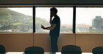 Phone call, man and nurse in hospital boardroom for communication, telehealth or online consultation. Cellphone, professional and healthcare worker on mobile discussion for medical service in clinic.