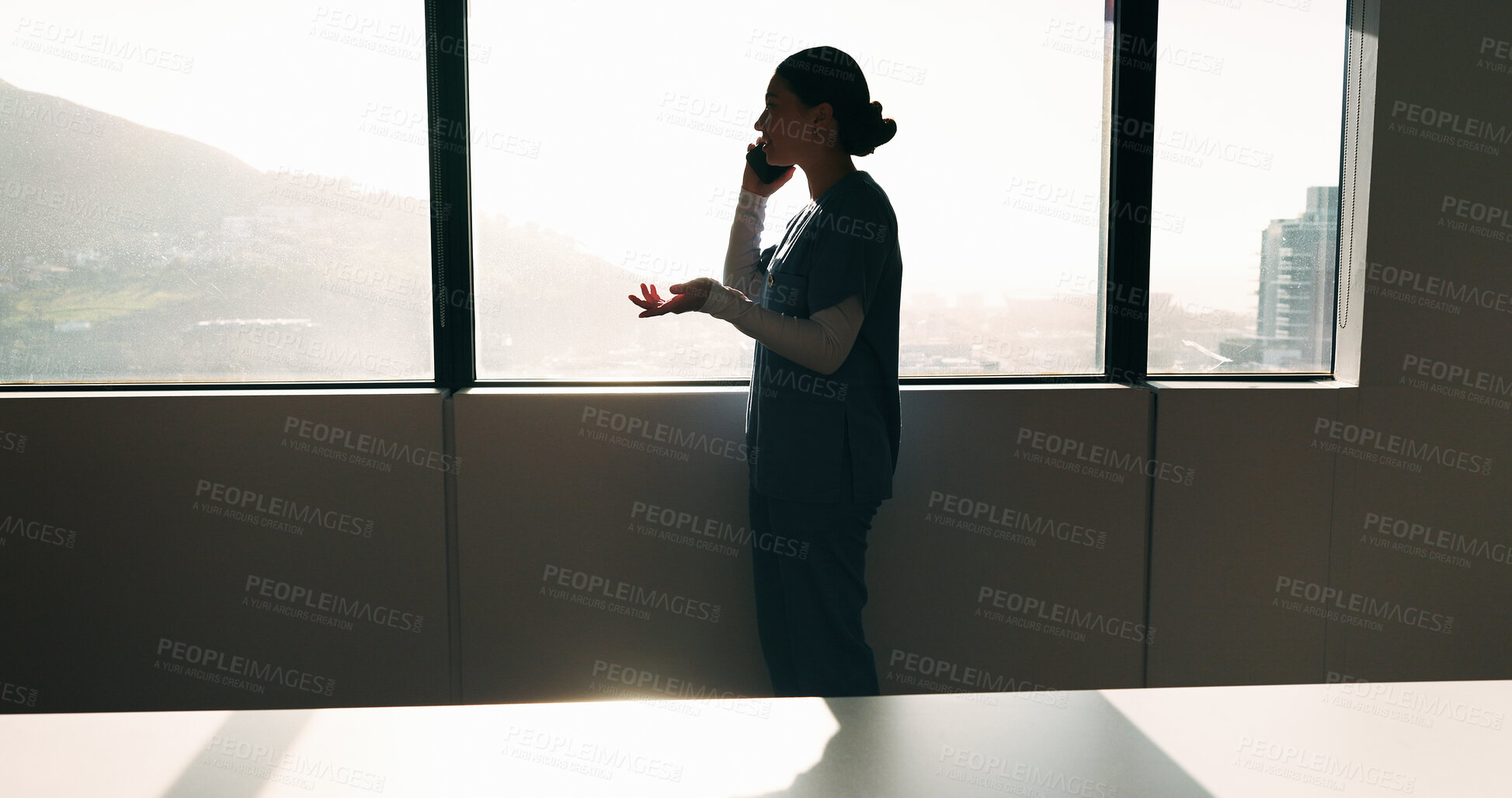 Buy stock photo Nurse, woman and phone call discussion at window for prescription order, telemedicine or feedback. Sunshine, professional or mobile contact in hospital for medical news, health update or conversation